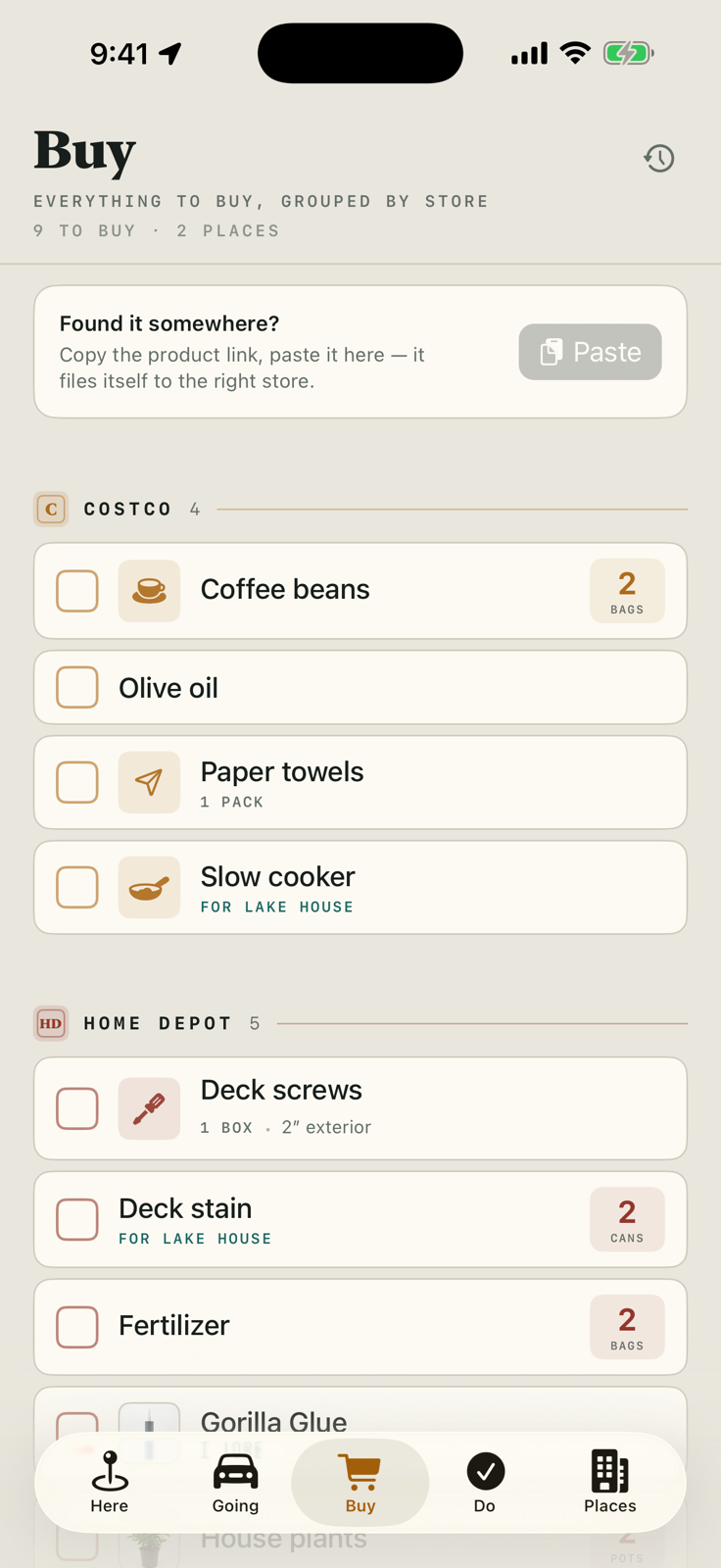 The Buy board in Bring Buy Get: a paste card under the title, then every open buy in the household grouped by store — Costco with coffee beans, olive oil, paper towels and a slow cooker for Lake House, and Home Depot with deck screws, deck stain, fertilizer and two shared-in products carrying their own photos.